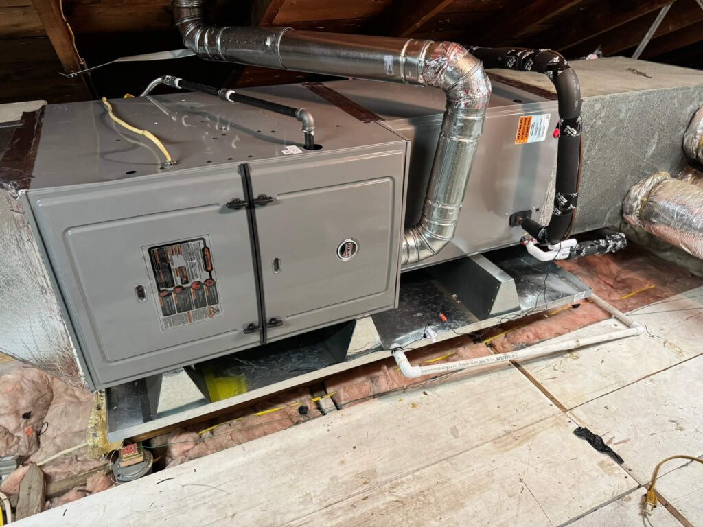 Air Conditioning Repair New Orleans - An image of a RUUD Blower unit in an attic in New Orleans, LA.