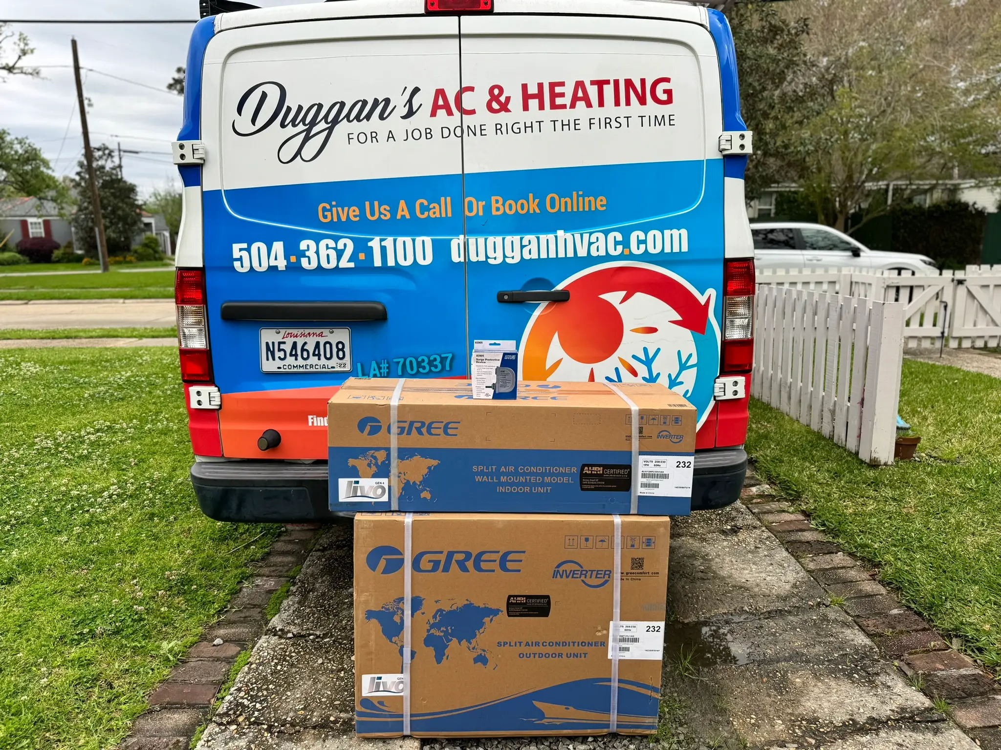 How Long Does it Take to Replace an HVAC System in Louisiana - An image of new AC Parts behind a Duggan's AC & Heating van.